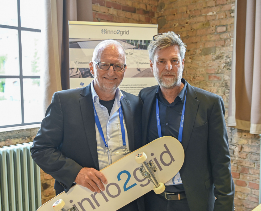 Frank Hinrichs und Stefan Klepzig bei der 10 Jahres-Feier von inno2grid auf dem EUREF-Campus