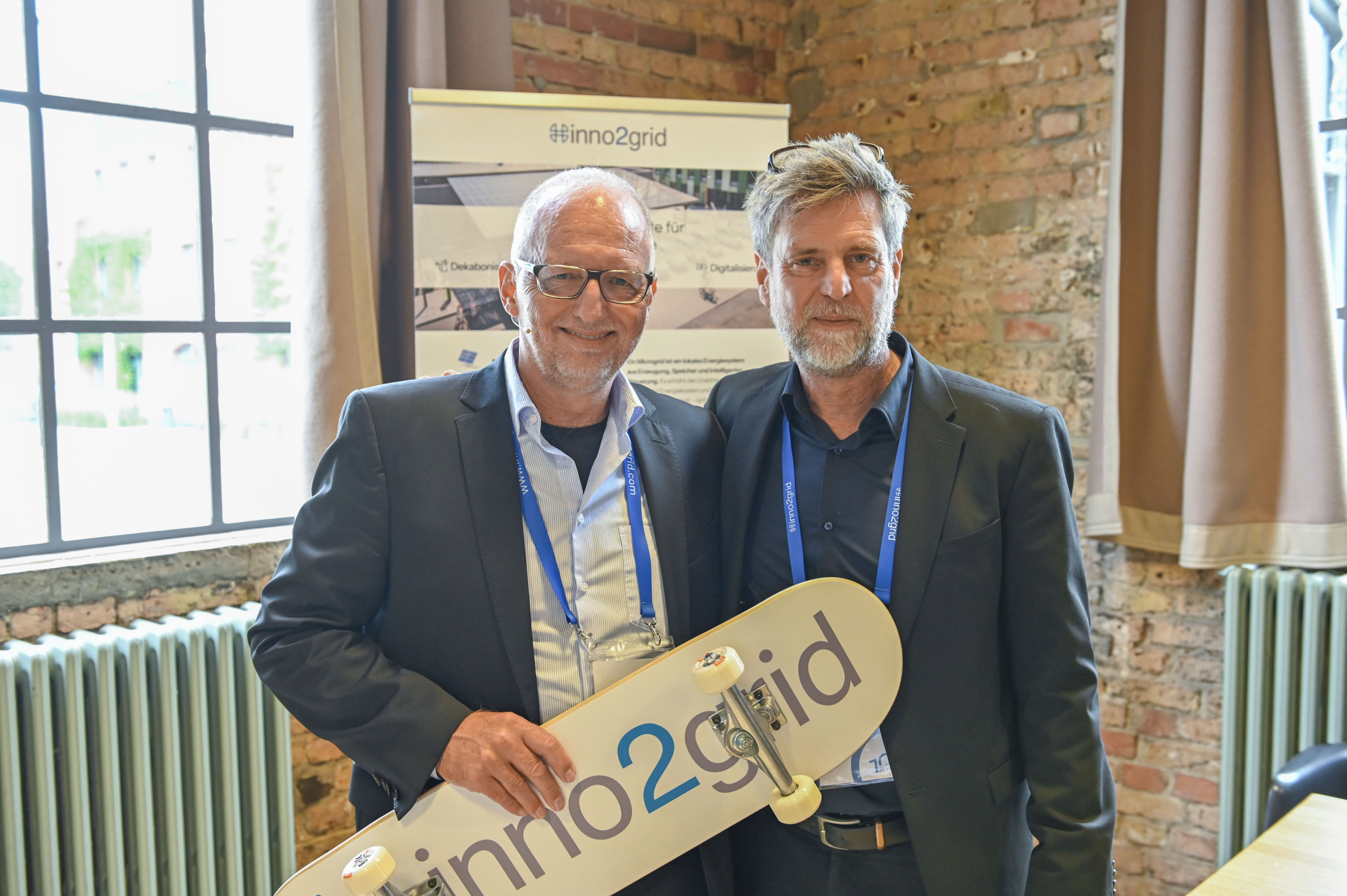Frank Hinrichs und Stefan Klepzig bei der 10 Jahres-Feier von inno2grid auf dem EUREF-Campus