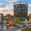 Aufnahme des EUREF-Campus. Man sieht den Gasometer und den Wasserturm bei Sonnenschein.